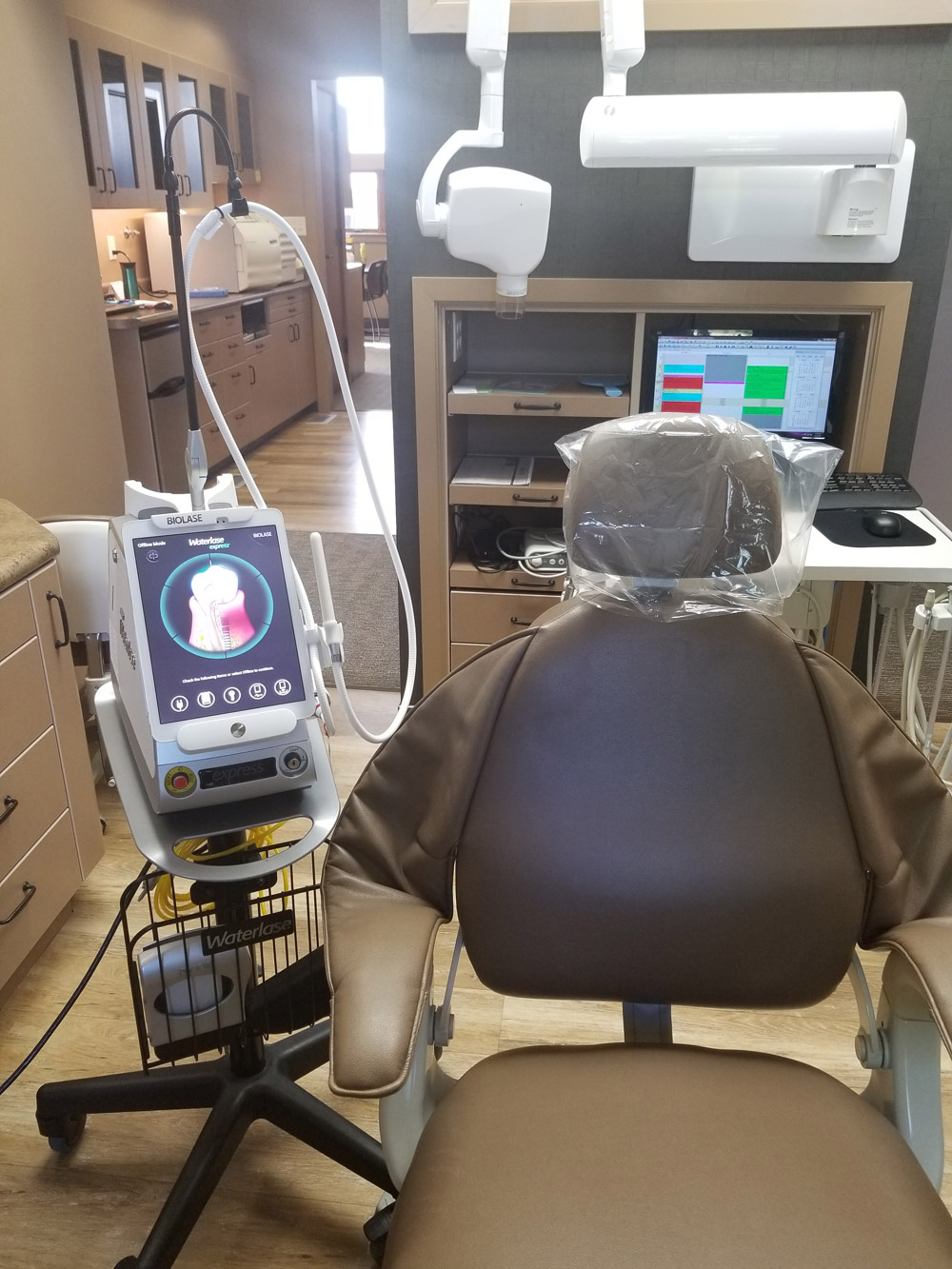 dental chair and machines for Laser Therapy in Cedar Falls, IA